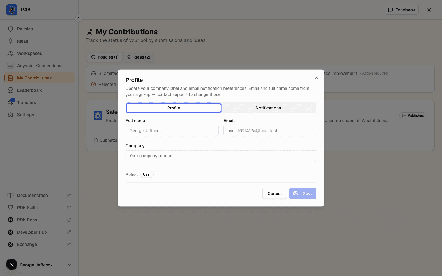 Profile dialog with Full name, Email, Company, and Roles fields