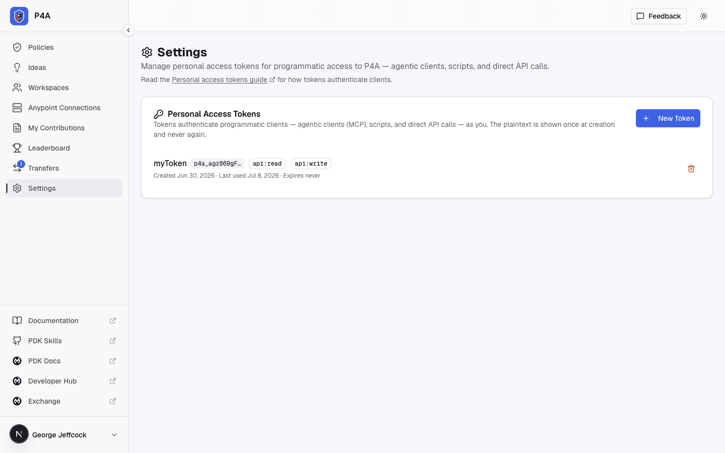 Settings page showing the Personal Access Tokens card with a list of existing tokens and a New Token button