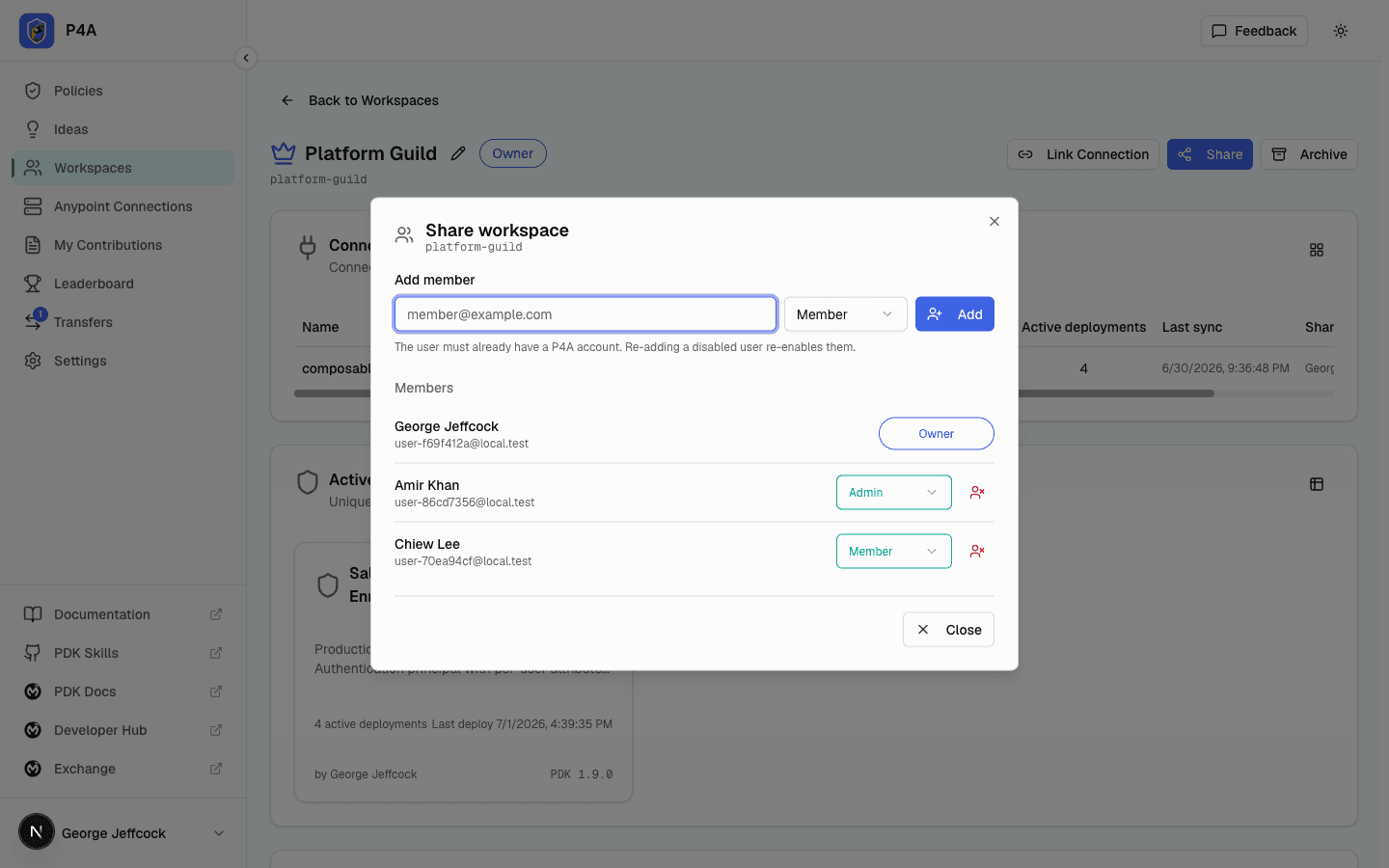 Share workspace dialog showing the Add member form, the Owner row locked, and a Member row with role dropdown and remove button